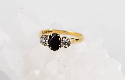 Lot 47 - An 18ct gold, diamond and sapphire ring, the...