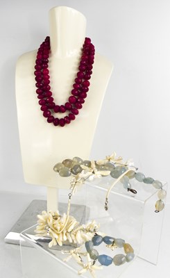 Lot 351 - Two ruby coloured beaded necklaces, a natural...