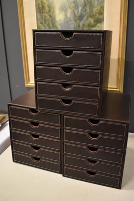 Lot 334 - Three leather clad jewellery boxes, composed...