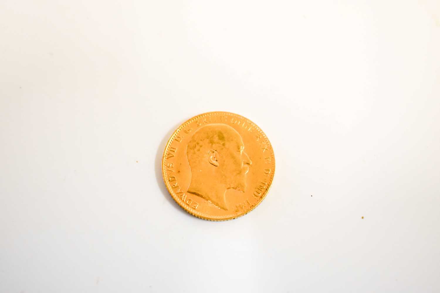 Lot 102 - An Edward VII full gold sovereign dated 1906.