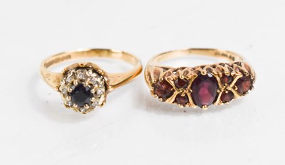 Lot 382 - A 9ct gold, sapphire and diamond ring, the...