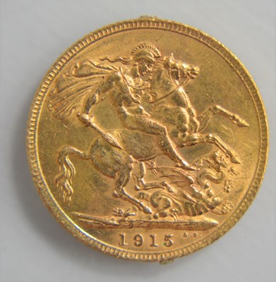 Lot 243 - A George V, full gold sovereign, dated 1915.