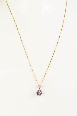 Lot 428 - A 14ct gold, diamond and tanzanite cluster...