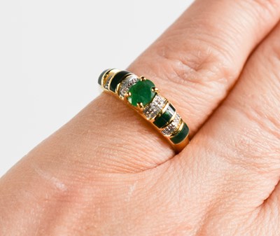 Lot 413 - A 9ct gold, emerald and diamond ring, size J-L,...