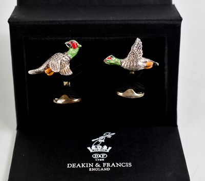 Lot 461 - A pair of silver and enamel Angry Game Bird...