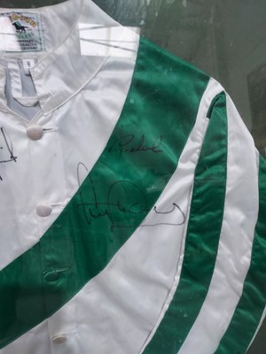 Lot 351 - A framed set of horse jockey racing silks by...