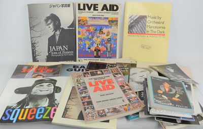 Lot 223 - A group of music memorabilia to include Live...