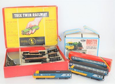 Lot 312 - A Trix Twin boxed part train set together with...