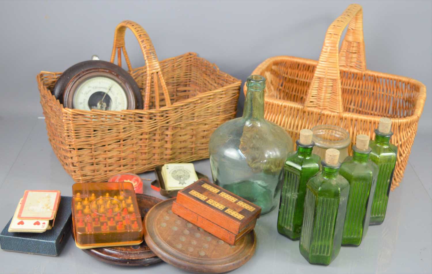 Lot 222 - Two vintage wicker baskets with handles...