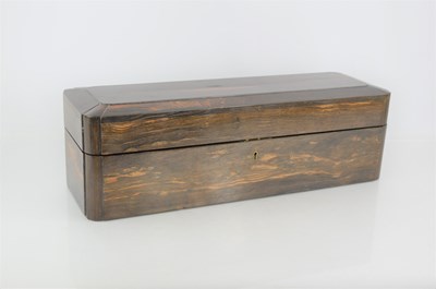 Lot 246 - A late 19th century coromandel glove box, red...