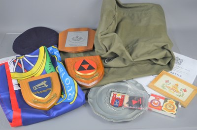 Lot 352 - A group of military related items to include a...