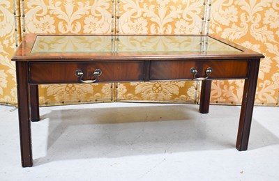 Lot 443 - A modern mahogany display coffee table with...