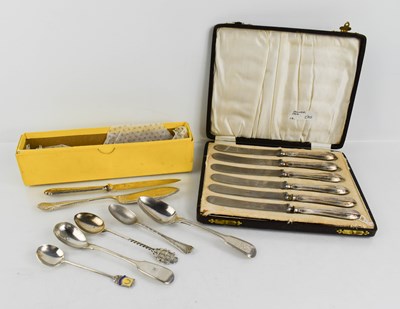 Lot 41 - A set of six silver handled butter knives,...