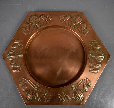 Lot 299 - A Newlyn style hexagonal dish, embossed with...