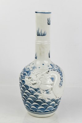 Lot 280 - A Chinese blue and white bottle vase, embossed...