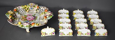 Lot 206 - A set of sixteen Sandizell porcelain name...