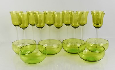 Lot 107 - A set of eleven mid century green wine glasses...