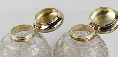 Lot 46 - A pair of large cut glass and silverplate dome...