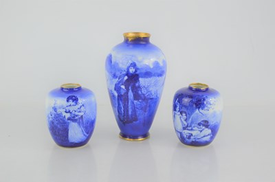 Lot 271 - A group of three Royal Doulton "Blue Children"...