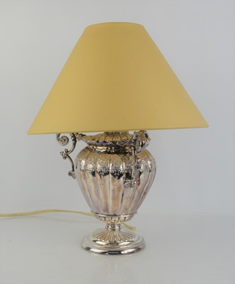 Lot 345 - A silver plated urn form table lamp with three...