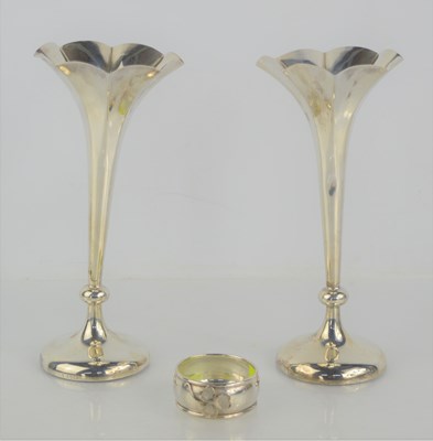 Lot 9 - A pair of silver bud vases hallmarked for...