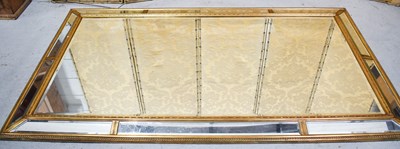 Lot 469 - A modern panelled wall mirror of large...