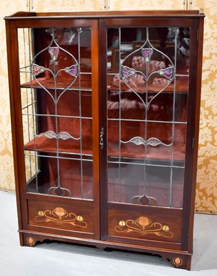 Lot 428 - An Art Nouveau mahogany glazed display cabinet,...