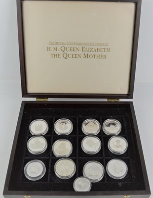 Lot 377 - A collection of thirteen silver proof coins,...