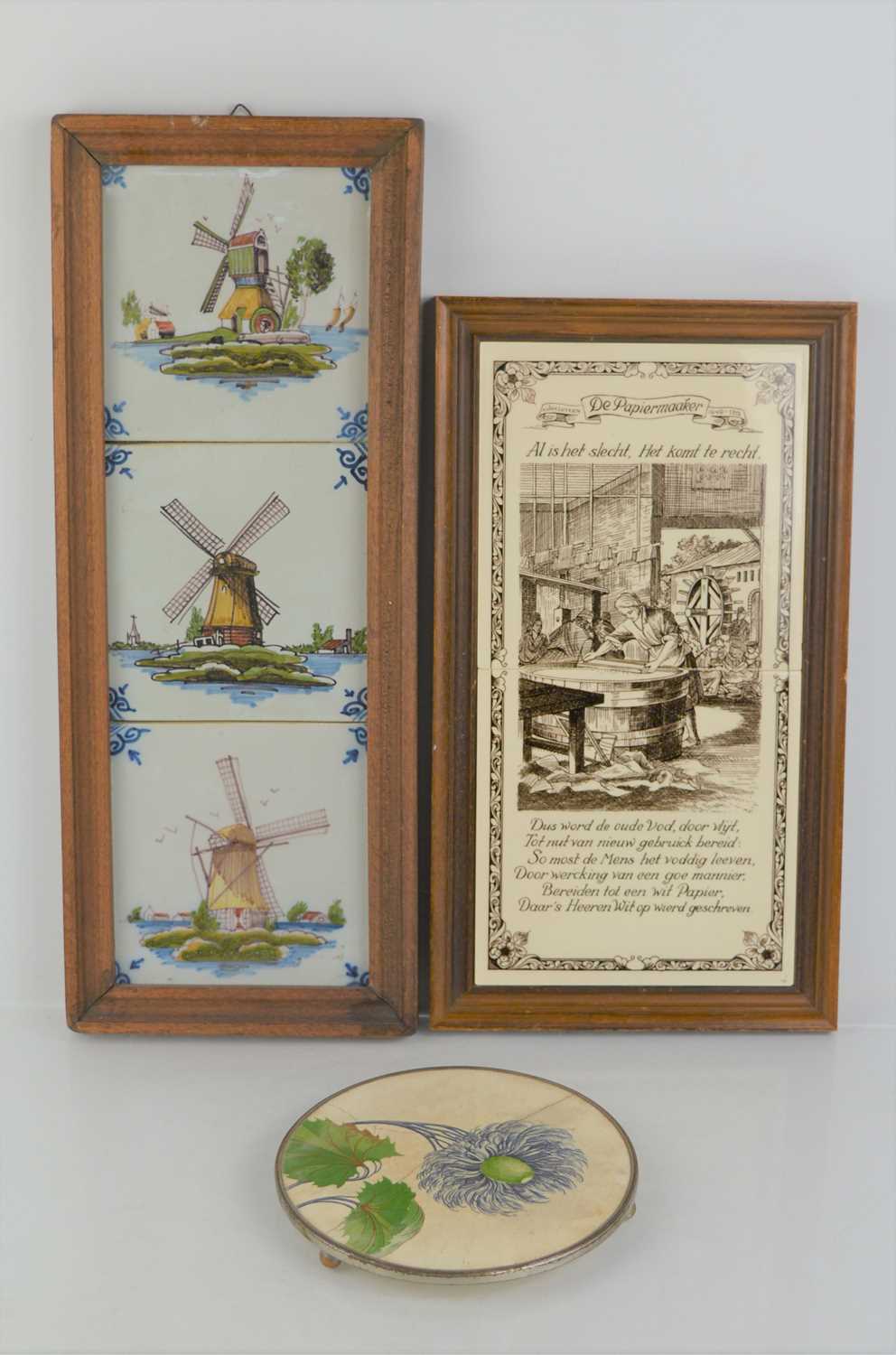 Lot 180 - A framed group of three Dutch delft tiles made...