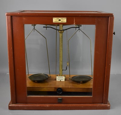 Lot 333 - A 19th century set of scales in a glass case,...