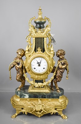 Lot 266 - An early 20th century mantle clock, ornately...