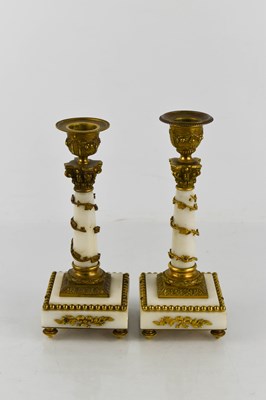 Lot 346 - A pair of 19th century candlesticks, the white...