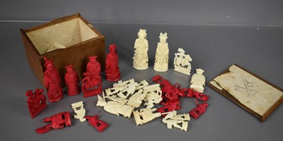 Lot 240 - A late 19th century Chinese full chess set,...