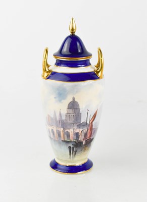 Lot 140 - A 20th century Minton vase and cover, painted...