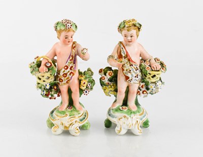 Lot 126 - A pair of 18th century Derby porcelain cherub...