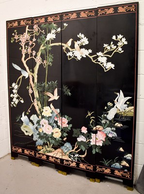 Lot 297 - A 20th century Chinese four panelled screen,...