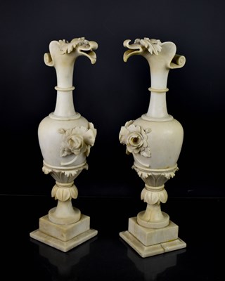 Lot 254 - A pair of 19th century alabaster urns, the...