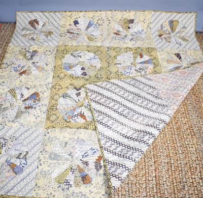 Lot 324 - A late 20th century Dresden plate design quilt,...