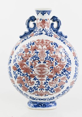 Lot 293 - A Chinese moon flask, in blue white and red,...