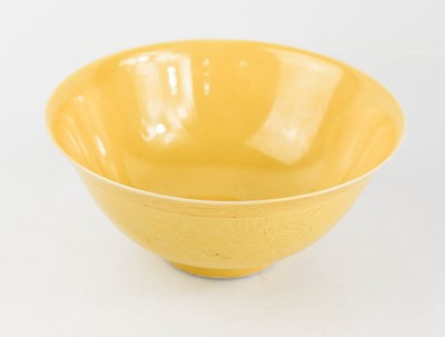 Lot 291 - A Chinese porcelain yellow glazed bowl,...