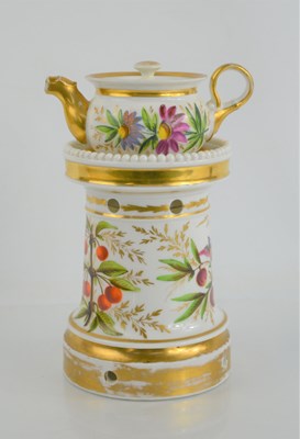 Lot 77 - A late 19th century porceain teapot on stand...