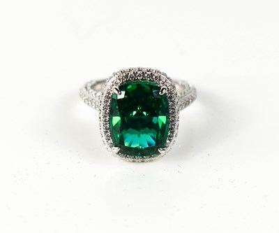 Lot 37 - A Pariba Tourmaline and silver ring, the...