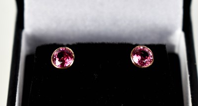 Lot 138 - A 9ct gold pink spinel pair of stud earrings.