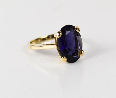 Lot 57 - A 9ct gold, oval iolite ring, the iolite...