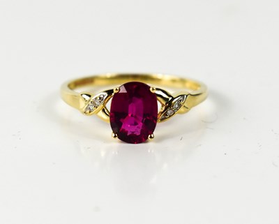 Lot 60 - A 9ct gold and oval pink tourmaline and...