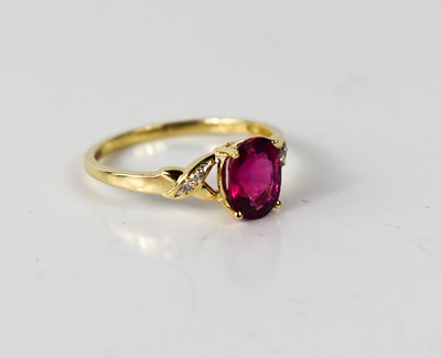 Lot 60 - A 9ct gold and oval pink tourmaline and...