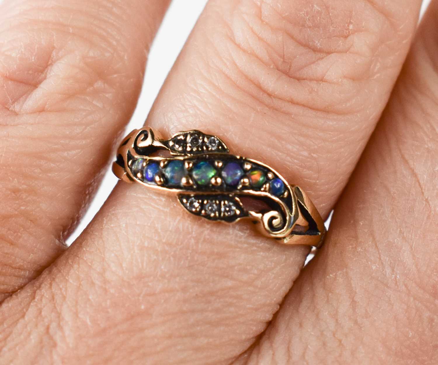 Lot 17 - A 9ct gold Victorian style opal and diamond...