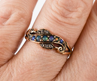Lot 17 - A 9ct gold Victorian style opal and diamond...