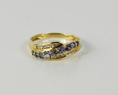 Lot 42 - A 9ct gold, tanzanite and diamond ring, size S.