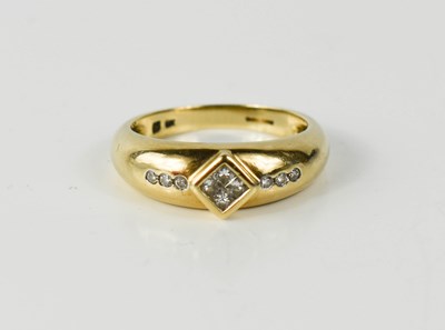 Lot 111 - A 9ct gold and diamond ring, set with princess...